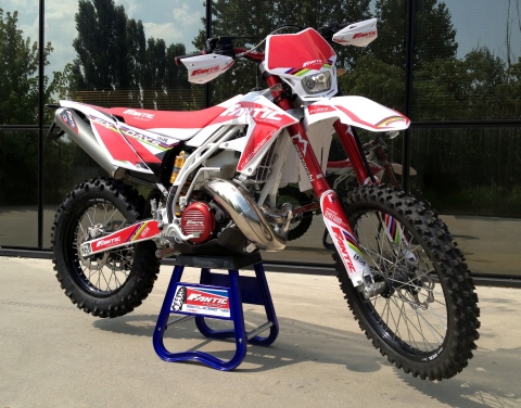 TR300 six days white frame chrome exhaust